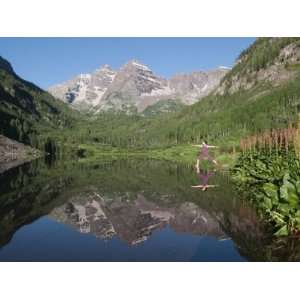  Young Woman Practicing Yoga in a Scenic Mountain Lake 