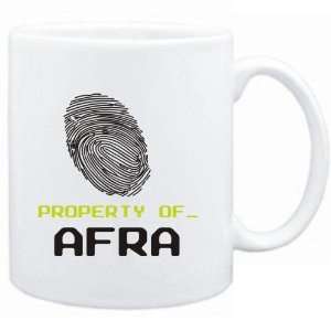  Mug White  Property of _ Afra   Fingerprint  Female 