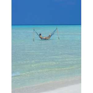  Couple Relaxing in Hammock, Maldives, Indian Ocean, Asia 
