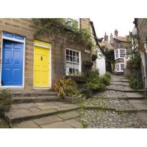  Yellow and Blue Doors on Houses in the Opening, Robin Hood 