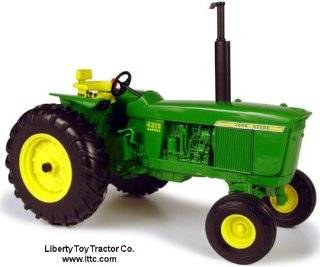  John Deere 1/16 scale toy tractors and equipment.