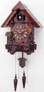 KASSEL BLACK FOREST CUCKOO CLOCK WITH A BIRD AND LEAF DESIGN