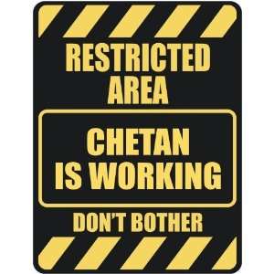   RESTRICTED AREA CHETAN IS WORKING  PARKING SIGN