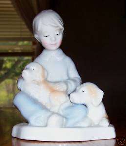 Sitting Boy with 2 Dogs Ceramic Figurine  