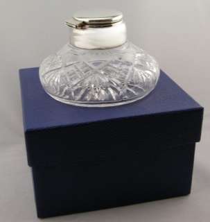 This is a very nice clear glass and silver plated inkwell. Nice clear 