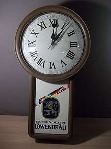 VINTAGE this world calls for LOWENBRAU BEER WALL CLOCK WORKS LION 