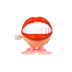  2 WIND UP SMILE TEETH Case Pack 48 Toys & Games
