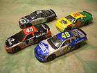 nice group of 4 assorted racing car vehicles vg ex