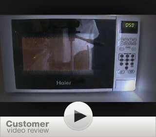    Haier MWM0701TW 700 Watt Countertop Microwave, White