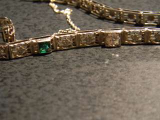 description emerald and diamond bracelet center diamond is 25ct old 