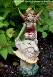 NEW FAIRY SITTING ON MUSHROOM WITH FACE RED DRESS  