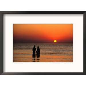 Couple Holding Hands at Sunset Over the Bay of Alcudia, Mallorca 