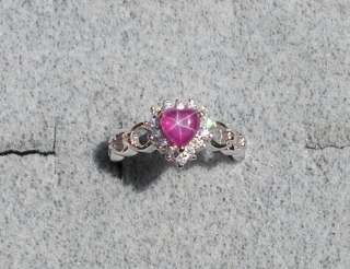 LINDE LINDY RED STAR RUBY CREATED SAPPHIRE ACCENTED HEART RHODIUM PLT 