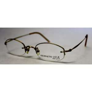   Cole New York Ophthalmic Eyewear Gold Oval Rimless Metal KC532 100